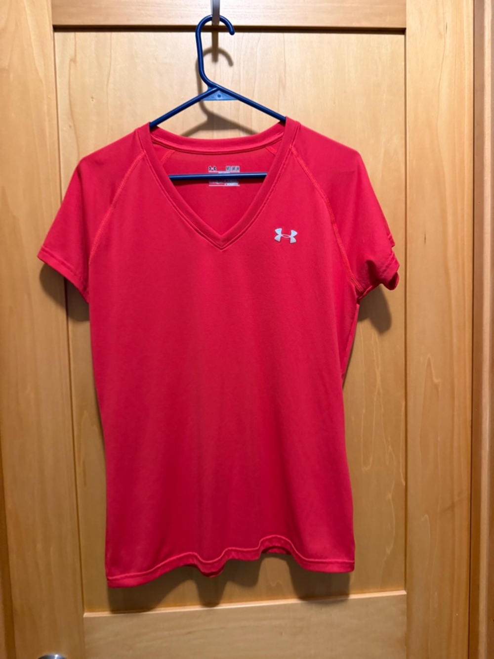 Under Armour Women's pink V-Neck Short Sleeve Performance Tee
